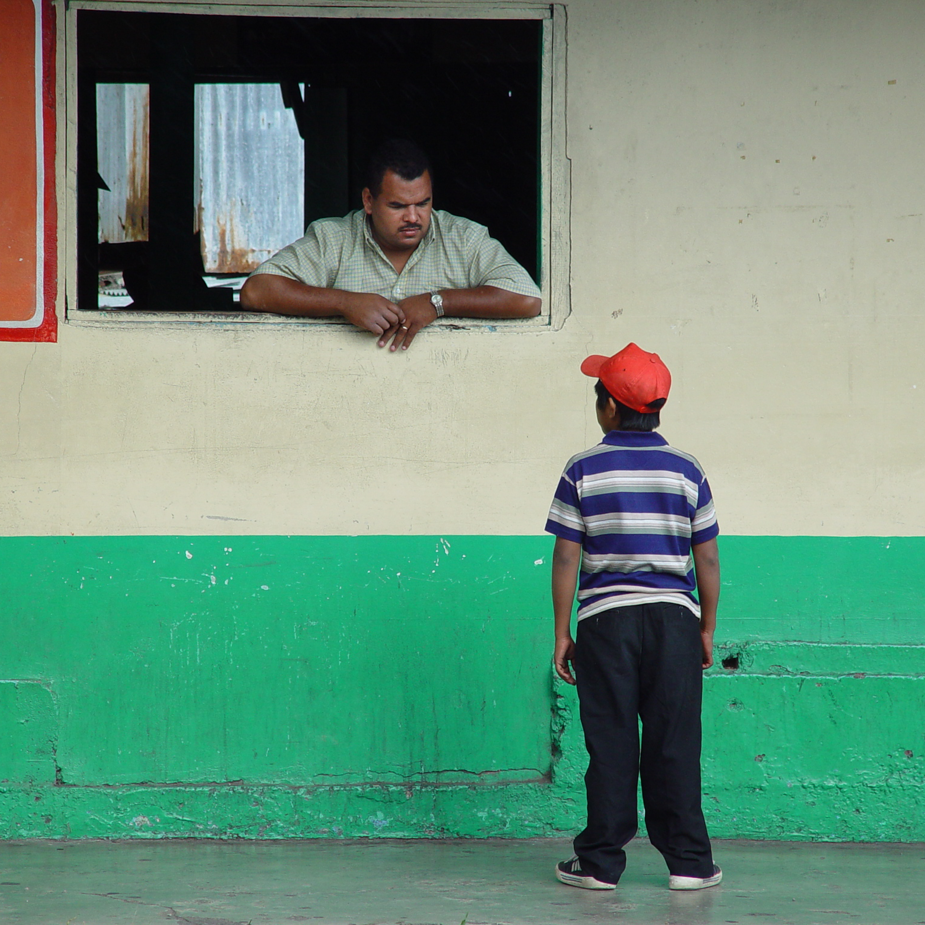 Man talking to boy, Boquete, Panama (2004)