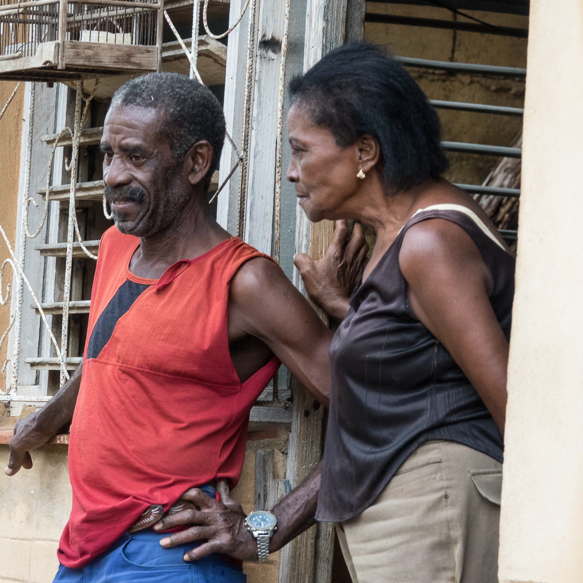 Couple in conversation on a street in Remedios